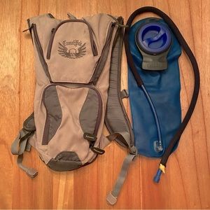 Camelbak Hydration Vest with 85oz bladder. Used but everything works great!